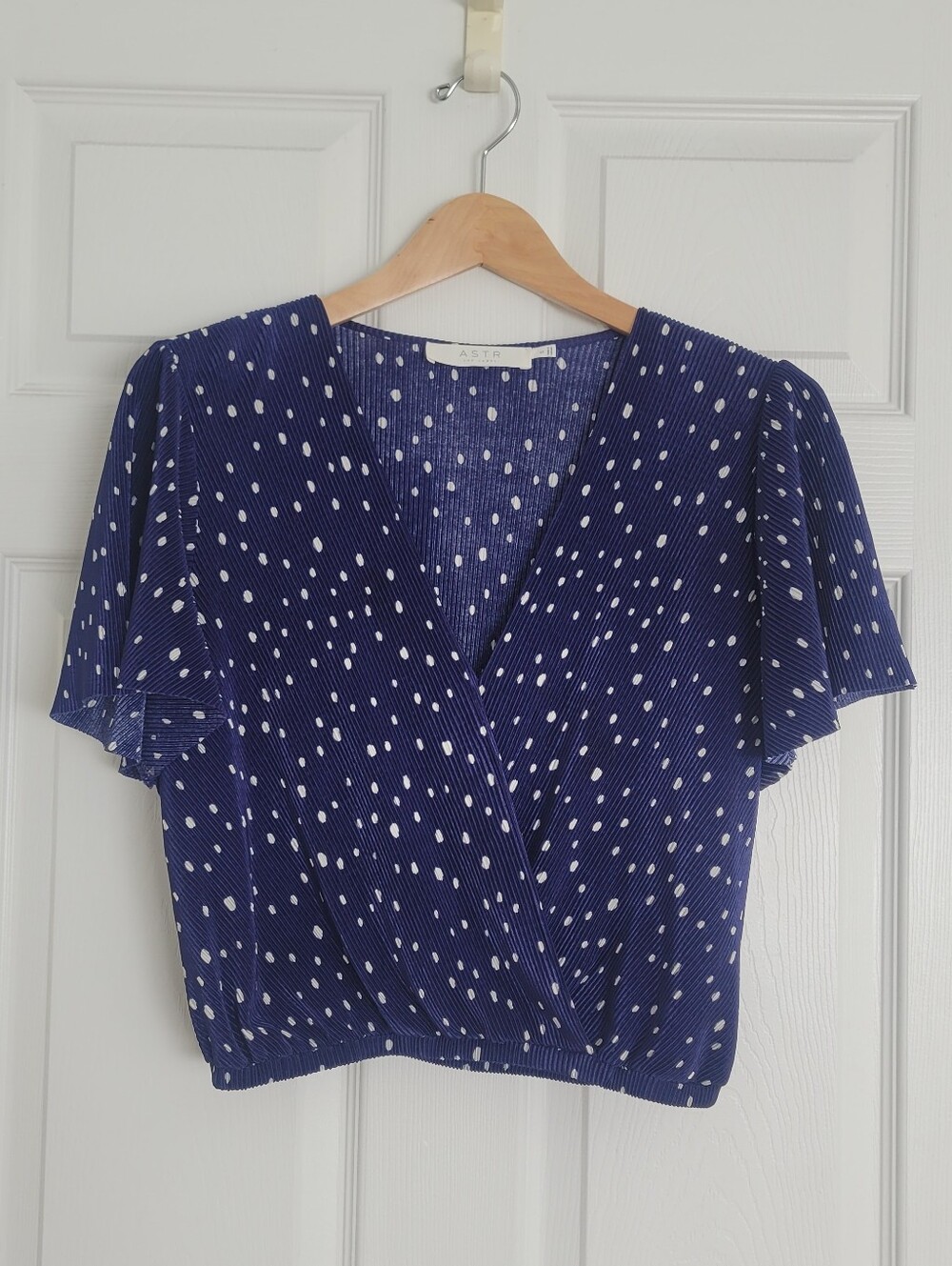 Astr Navy Polka Dot V-Neck Flutter Sleeve Wrap Top